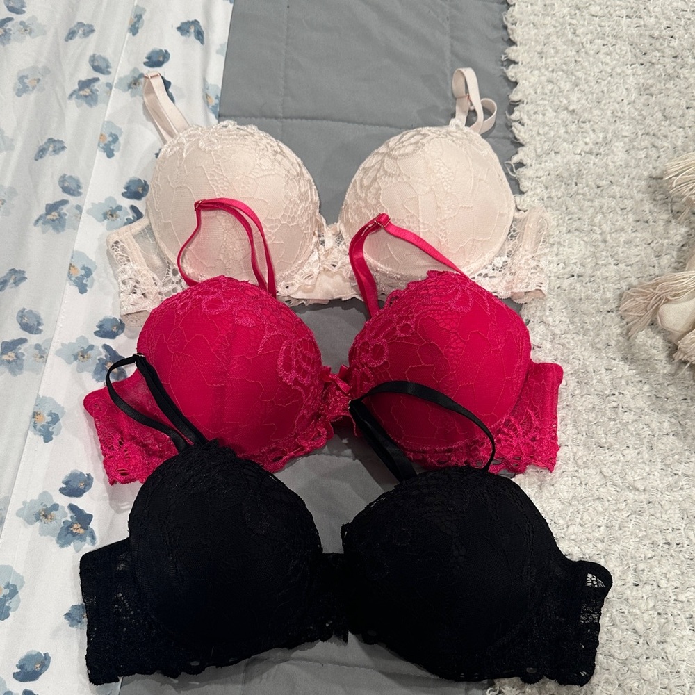 Elegant Lace Bra Set - Black, Red, and Cream never worn